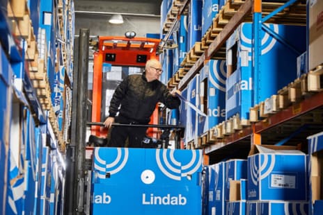 Person on a forklift in Lindab facility