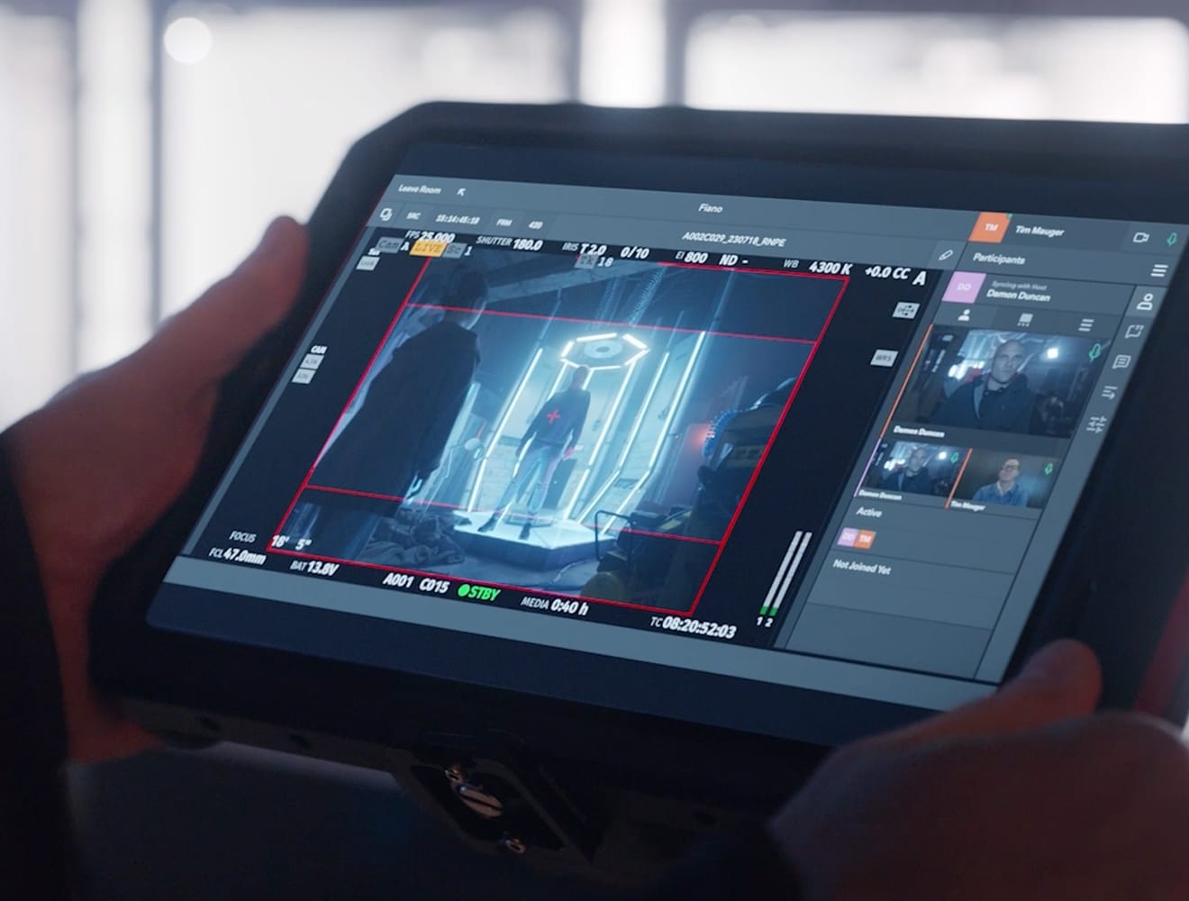 Camera crew filming on location during on-set production.