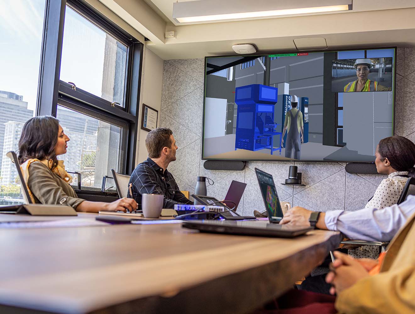 Meeting in a conference room at the Autodesk San Francisco Technology Center.