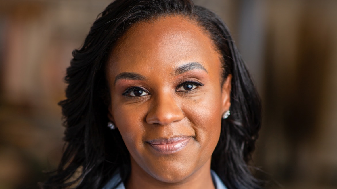 Headshot image of Laurin Leonard, CEO and President, R3 Score Technologies—smiling and looking at the camera.