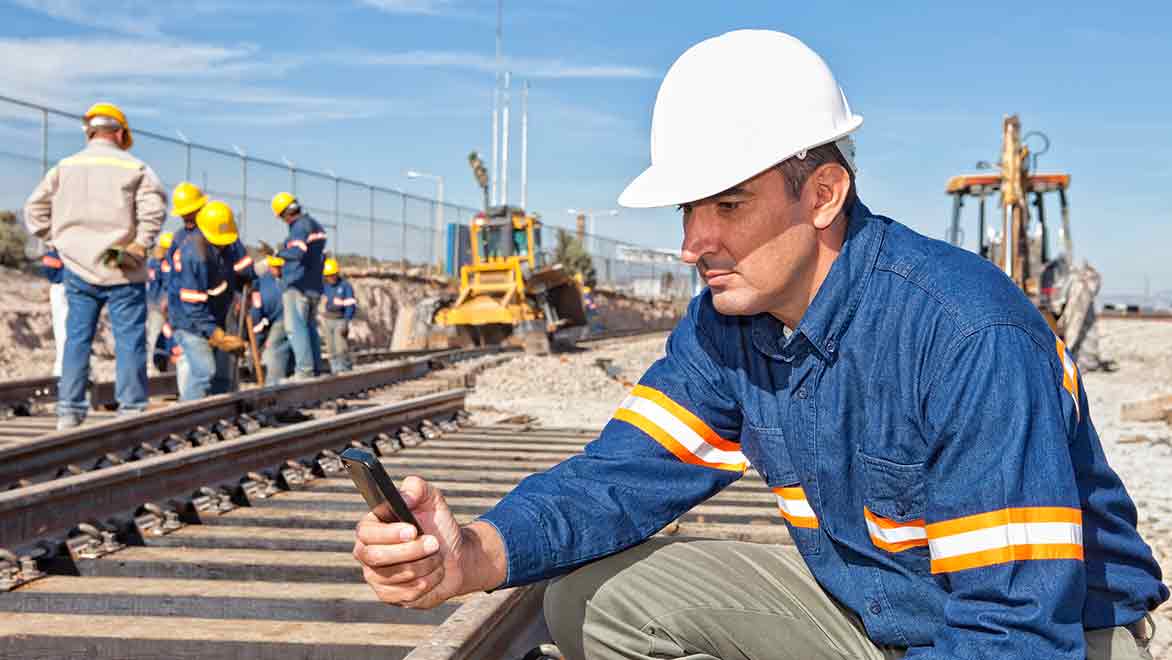 Engineer at a rail construction site.