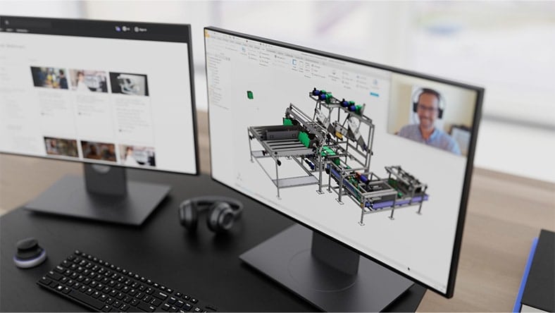 3D model of machine assembly being designed in Autodesk Inventor displayed on monitor