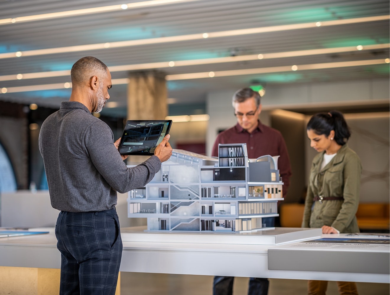 Architect reviewing BIM model on tablet