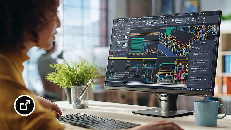 Proffs använder AutoCAD på en stationär skärm i kontorsmiljö