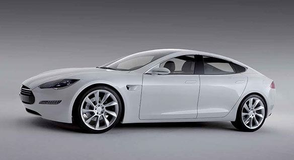 White, 4-door car with sleek lines