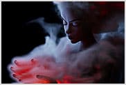 Figure surrounded by glowing smoke