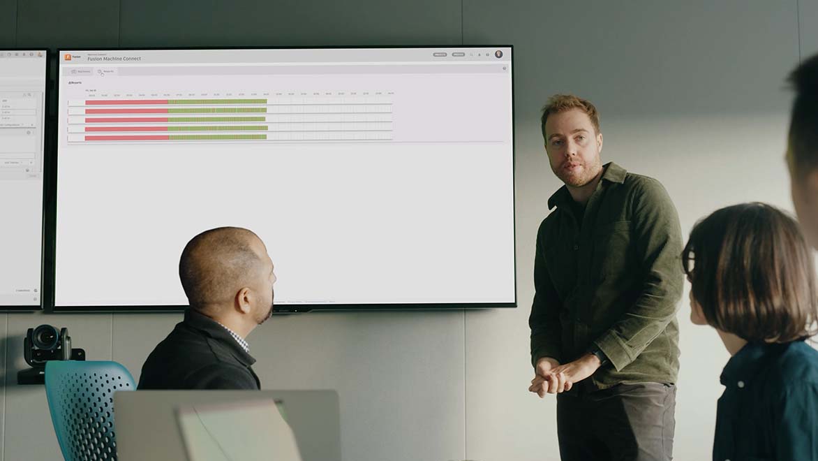 Image: A production team uses the Fusion Machine Connect interface to review the historic data from multiple machines