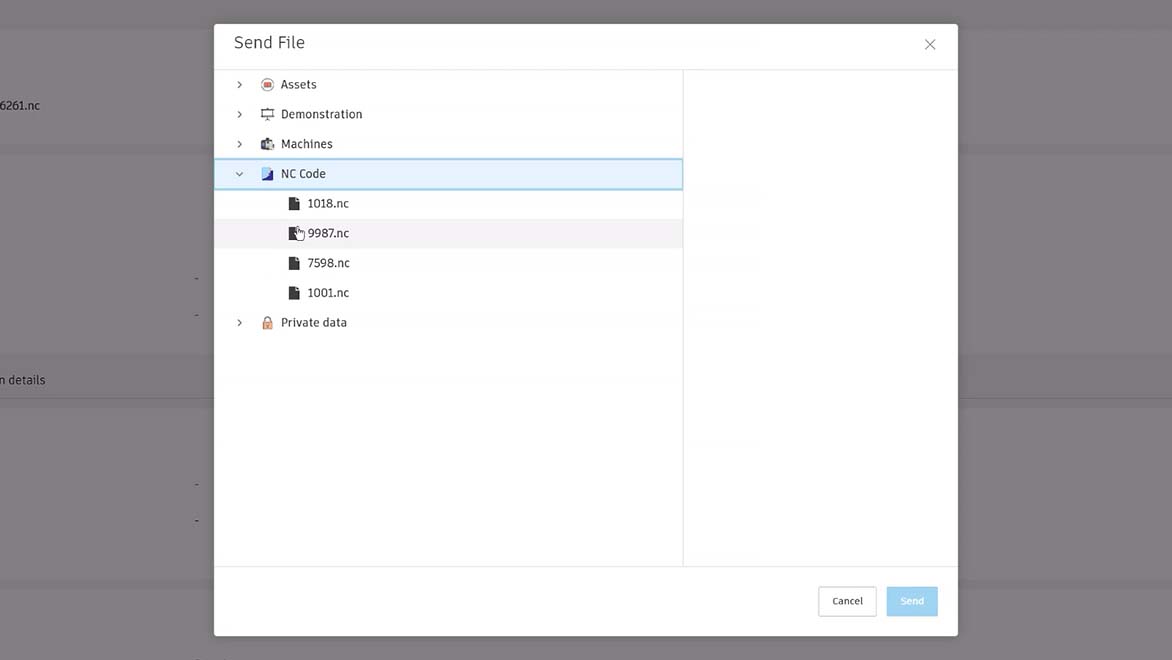 Image: A machine operator interacting with a CNC machine