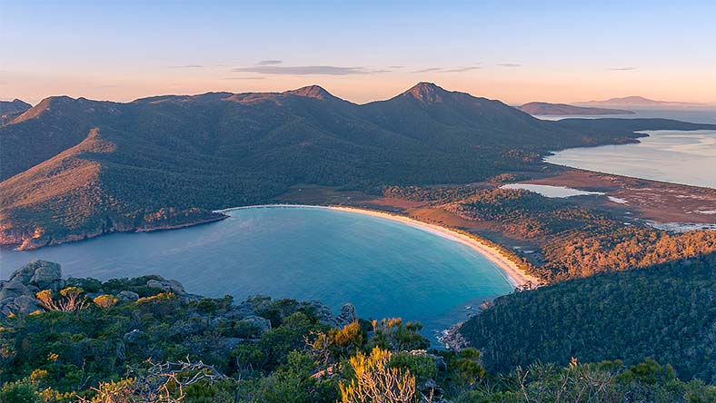 Body of water surrounded by mountains in Tasmania