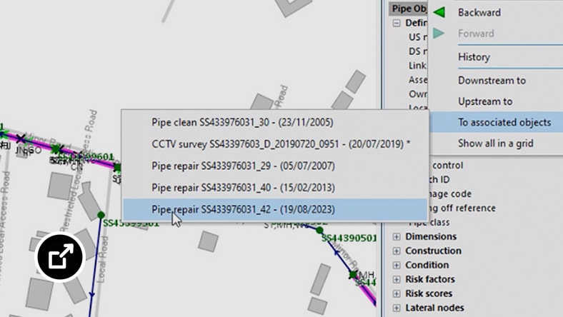 GIS software interface displays map with various layers and data points representing a sewer system. 