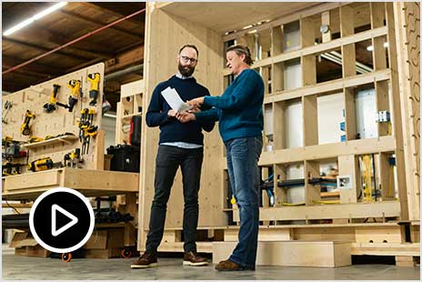 Architect and Engineer standing in front of volumetric modular component 