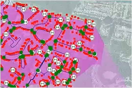 Water distribution network simulation in InfoWorks WS Pro, displaying a map with icons and graphs for incident analysis