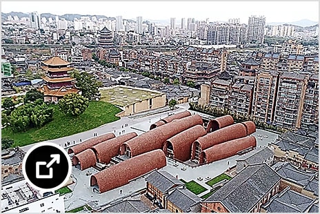 Luchtfoto van het Imperial Kiln-museum in Jingdezhen (China), bestaande uit structuren van ronde bakstenen