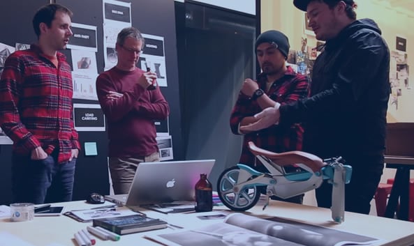 INDUSTRY PDX team collaborating on design of 3D-printed bicycle