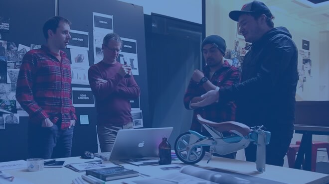 INDUSTRY PDX team collaborating on design of 3D-printed bicycle