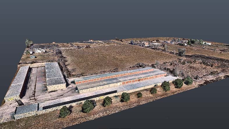 Point cloud of land development site including buildings and open land.