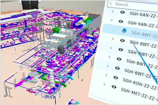 Virtual reality team looking at a building model 