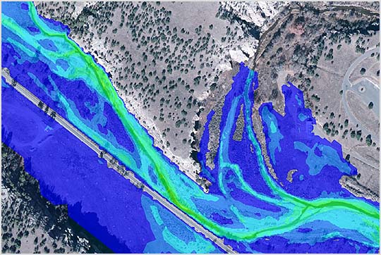 Aerial view of a river with overlaid data showing the impacts of flooding on the nearby area