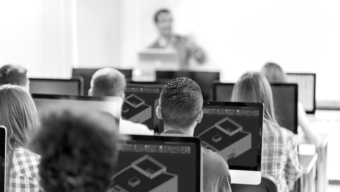 students in classroom learning AutoCAD software