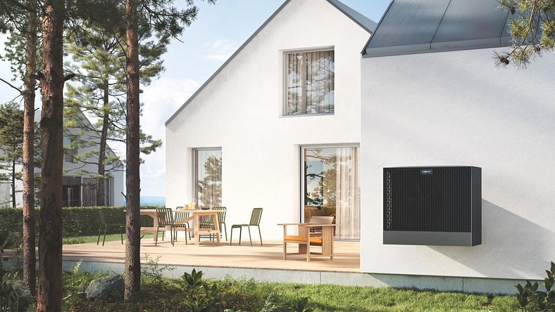 External view of a modern home with a heat pump installed.