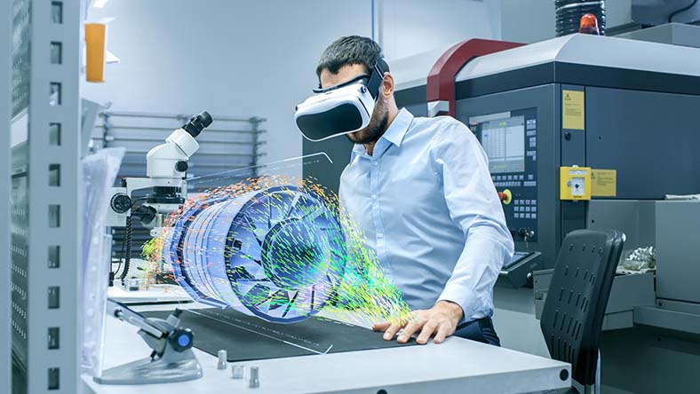 Factory engineer wearing VR headset designs engine turbine on holographic projection table