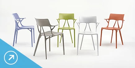 Five modern-styled, molded chairs of varying colors