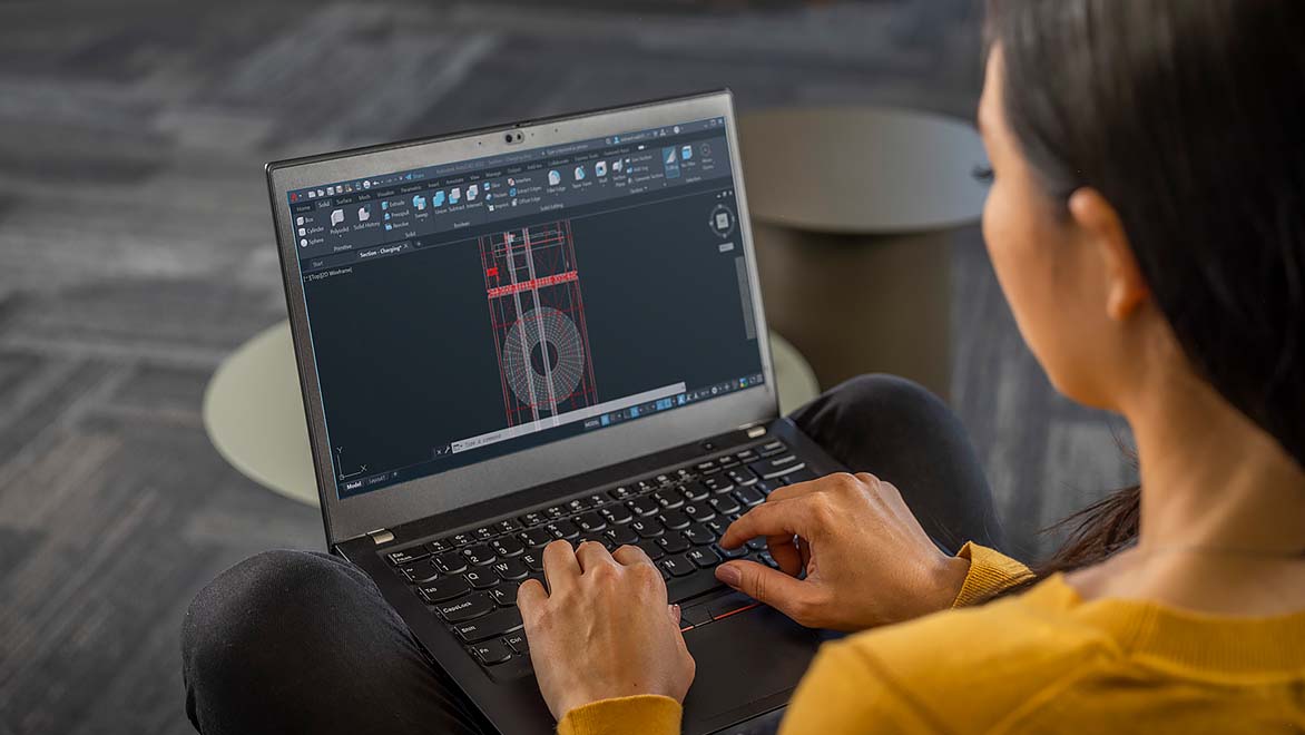 student working on design