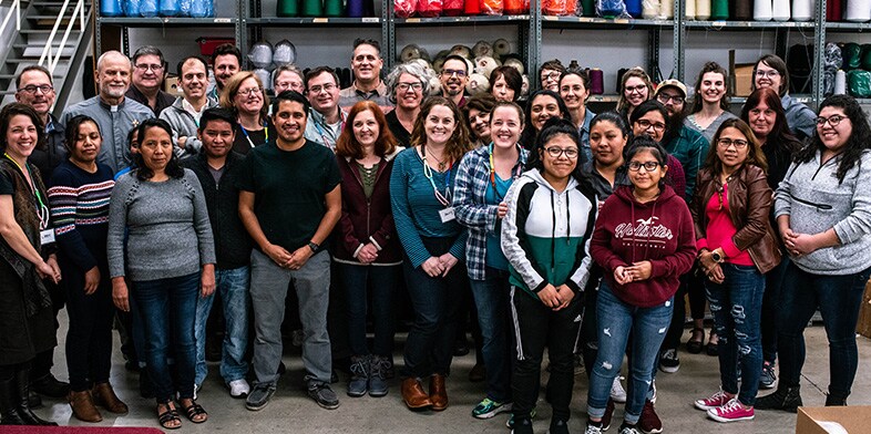 Group photo of employees at The Industrial Commons